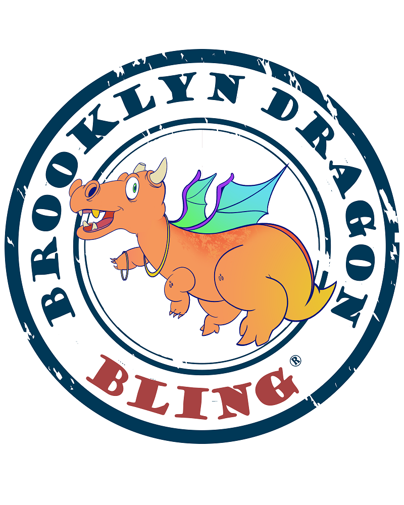 Close-up of the Brooklyn Dragon Bling stamp: navy distressed ring with BROOKLYN DRAGON on top and BLING in red, around an orange and yellow dragon with teal wings, gold chain, and gold hoop rings